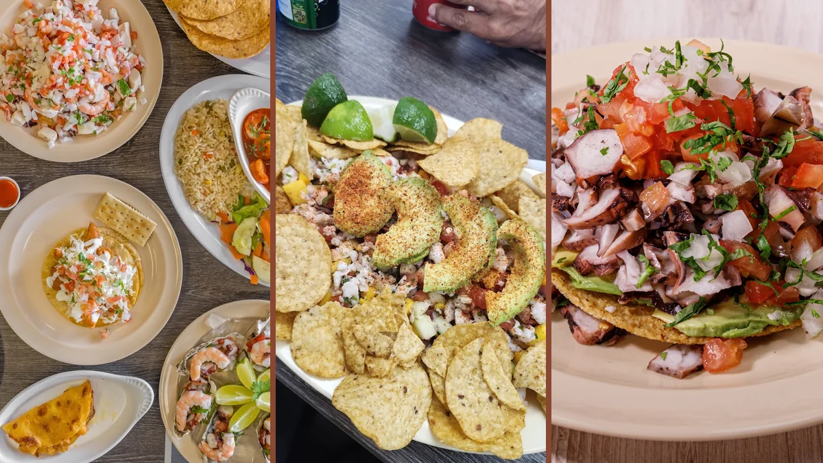 Colorful Mexican seafood spread in restaurant lighting.