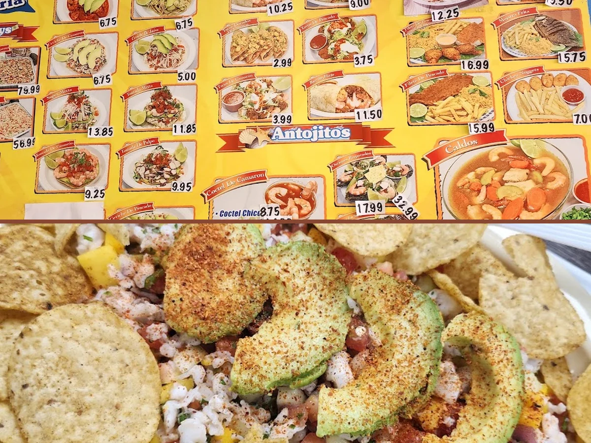 Colorful Mexican seafood spread in restaurant lighting.