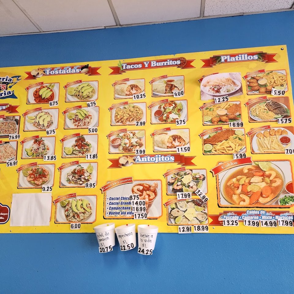 Ceviche, tacos, and cocteles on display.